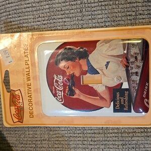 Coca cola wall plate